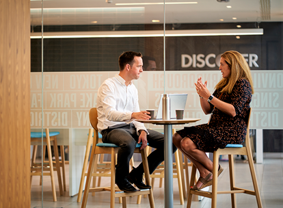 Discover Employees Meeting In Office
